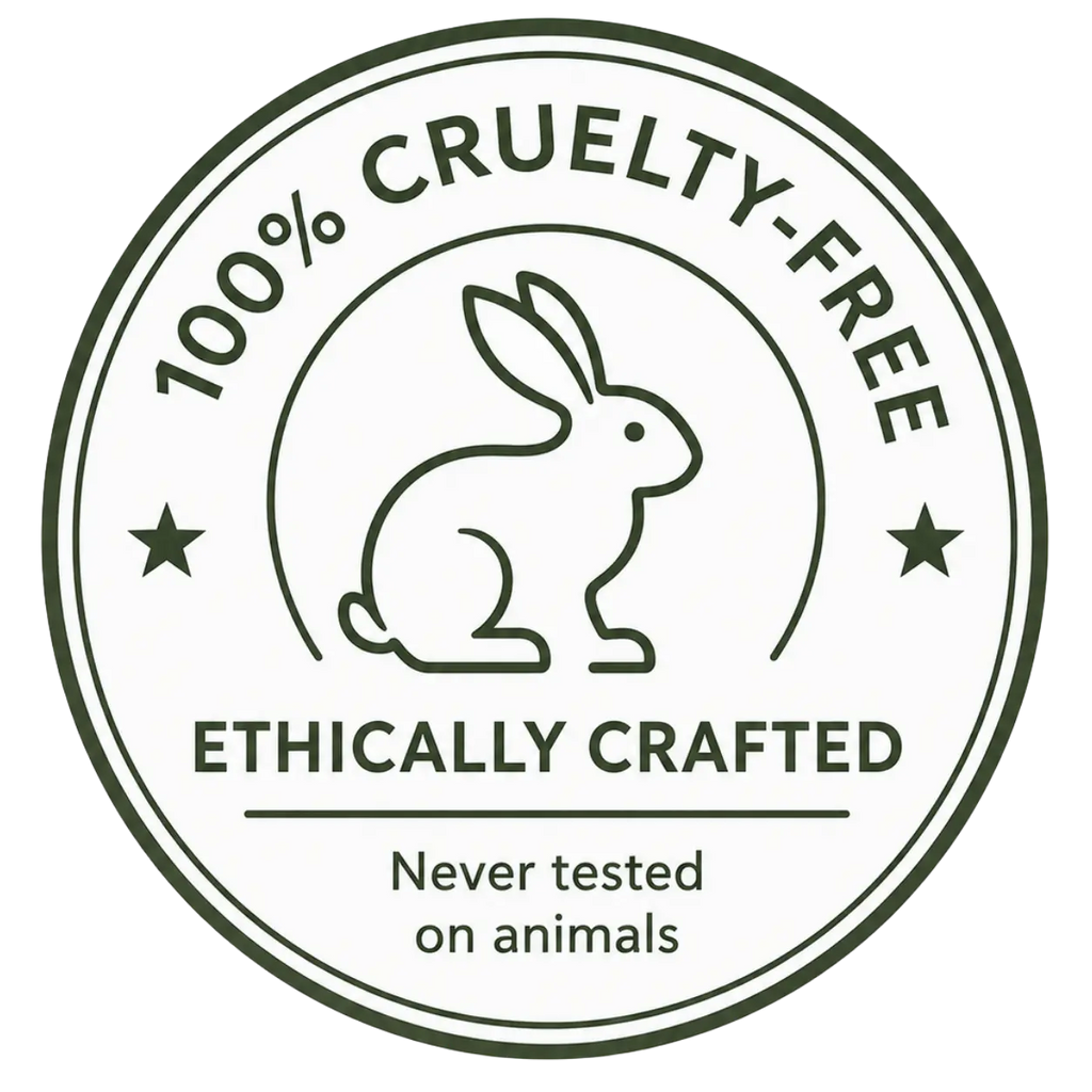 A circular, dark green stamp badge featuring a minimalist line-art drawing of a rabbit in the center. The curved text along the top edge reads "100% CRUELTY-FREE," flanked by stars. Below the rabbit, the bold text reads "ETHICALLY CRAFTED," with a tagline underneath reading, "Never tested on animals."