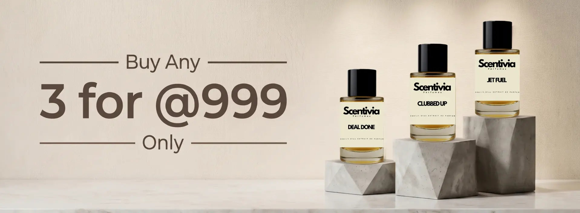 Scentivia Perfumes promotional banner for a "Buy Any 3 for @999 Only" offer, showcasing Deal Done, Clubbed Up, and Jet Fuel fragrance bottles arranged on marble display blocks.