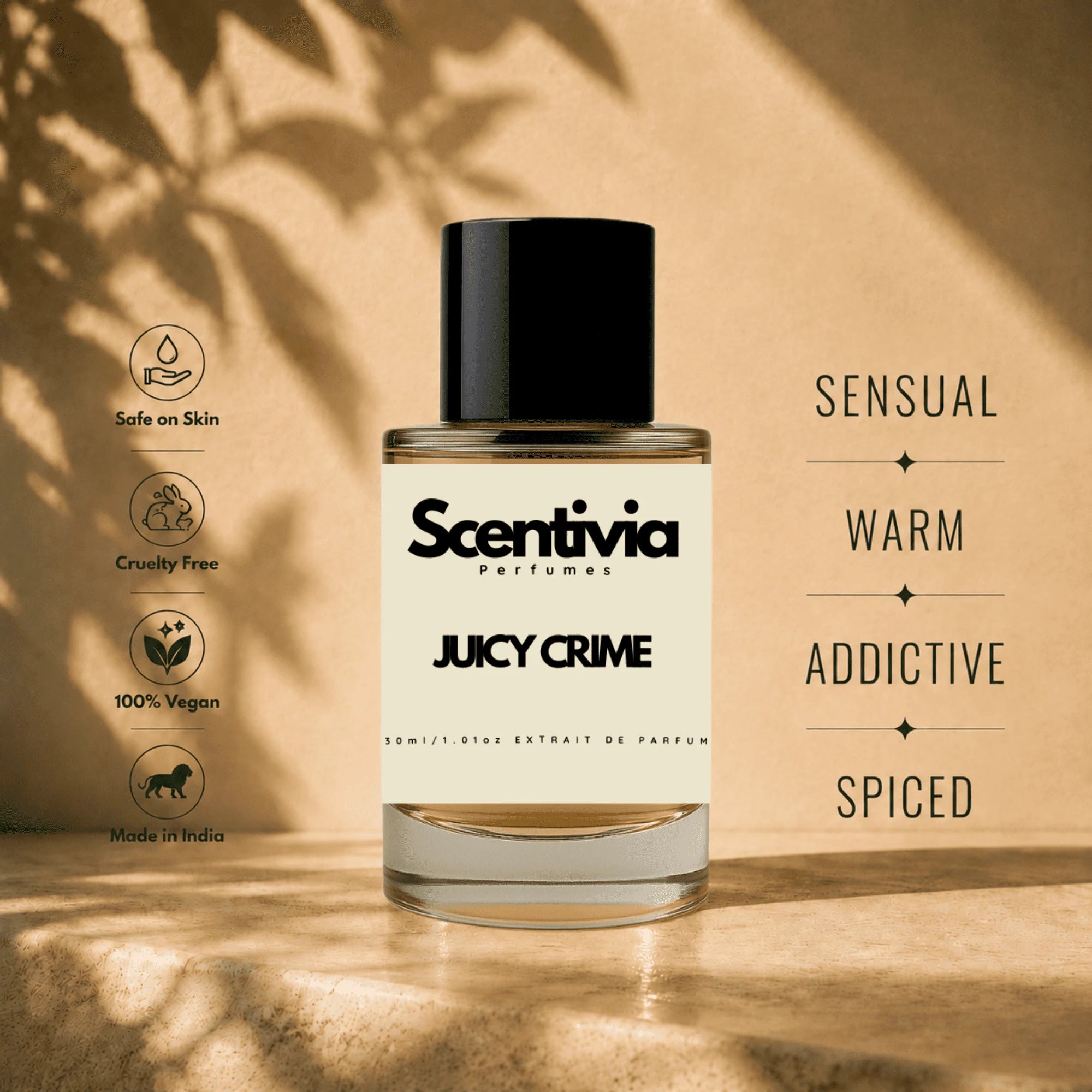 Scentivia Juicy Crime perfume bottle displayed on a stone ledge, featuring descriptive labels like Sensual, Warm, Addictive, and Spiced.