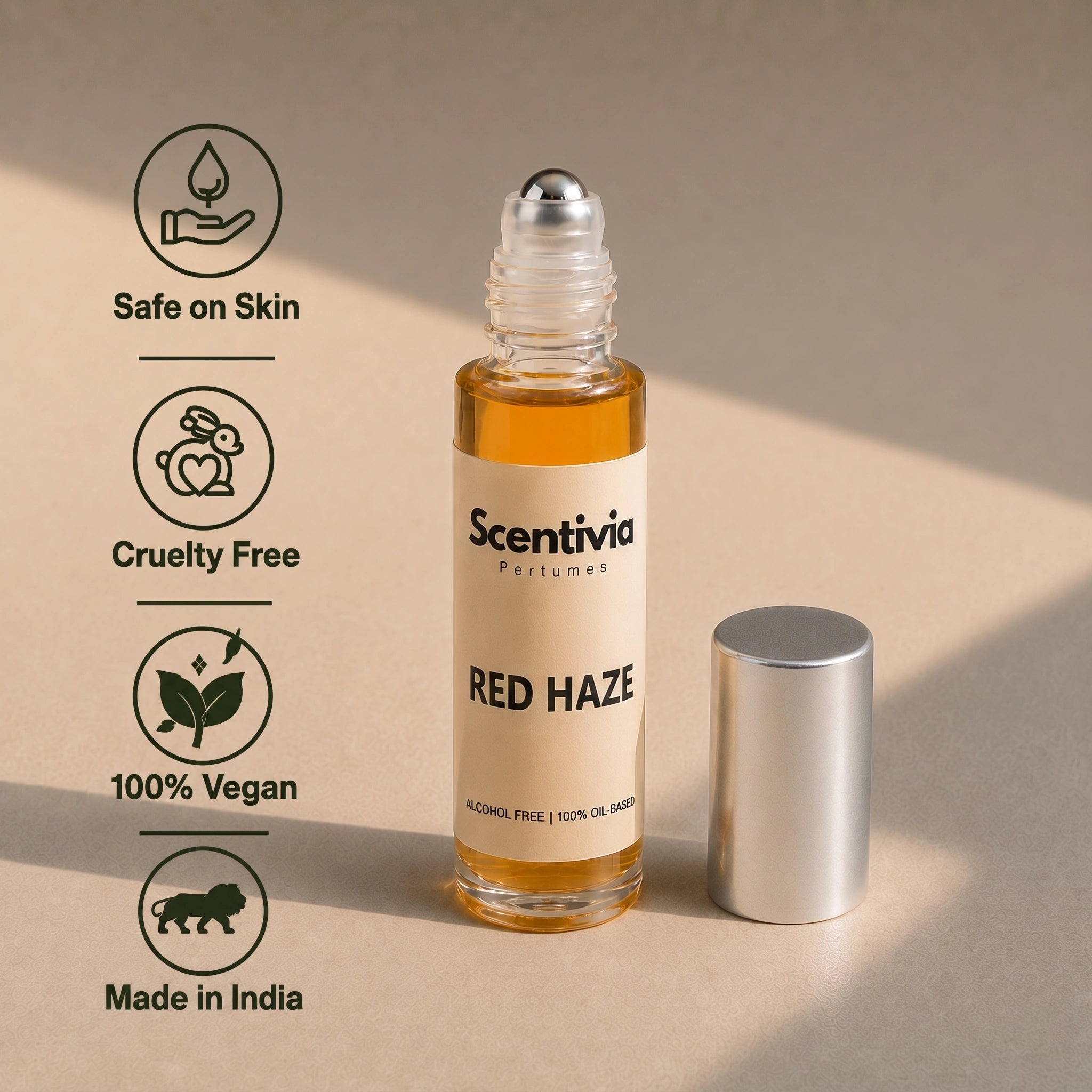Red Haze Roll On bottle highlighting skin safe, cruelty free, vegan and Made in India alcohol free perfume benefits
