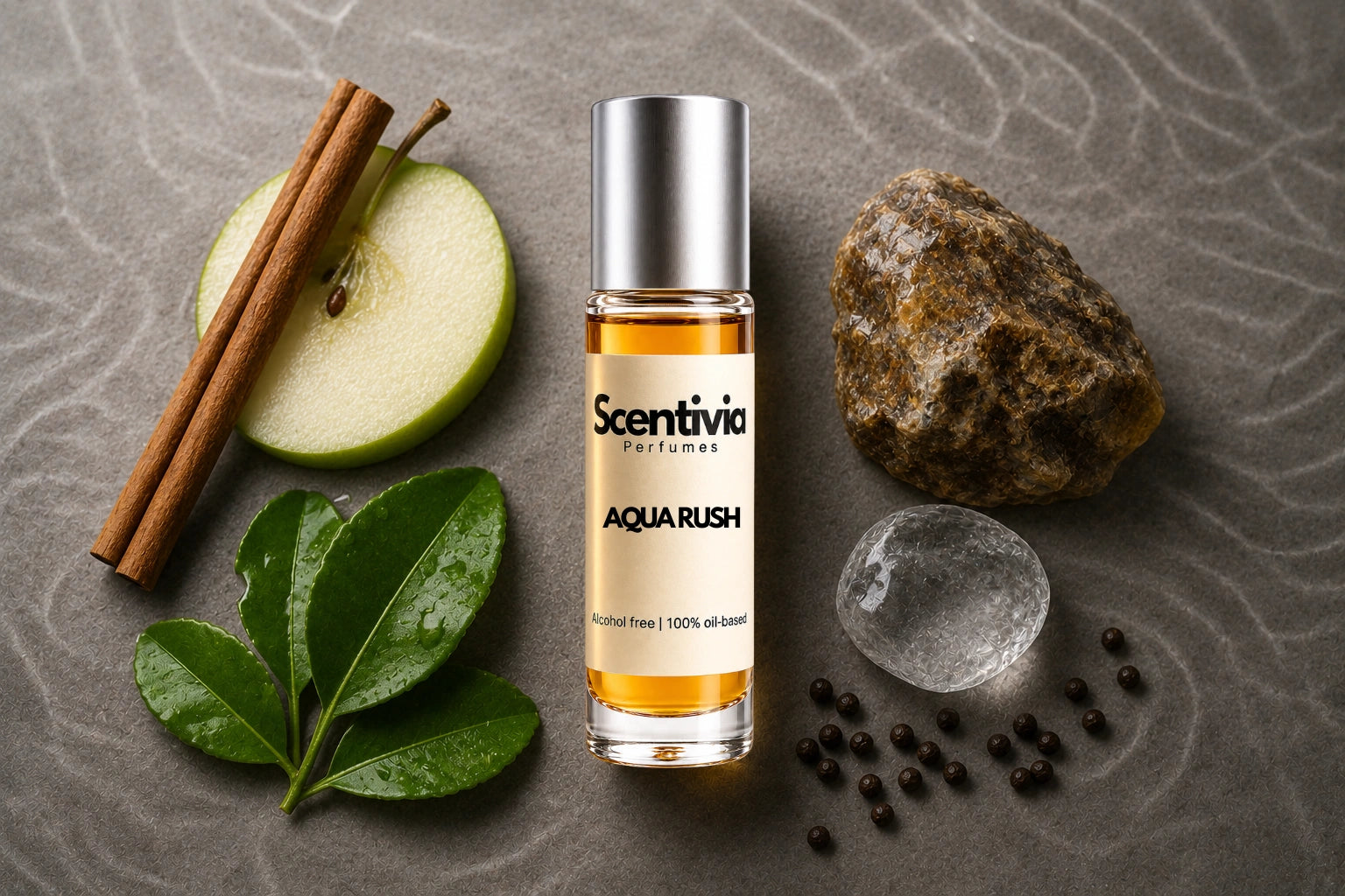 Aqua Rush Roll On bottle surrounded by Apple, Cinnamon, Citrus Leaves, Minerals and Pepper with fresh aquatic notes