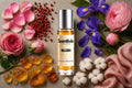 Blush Roll On bottle surrounded by Rose Petals, Iris, Pink Pepper, Amber and Cotton with soft floral notes