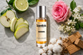 Wardiya roll on bottle with Bergamot, Green Apple, Rose, Jasmine, Cotton and Sandalwood on marble background