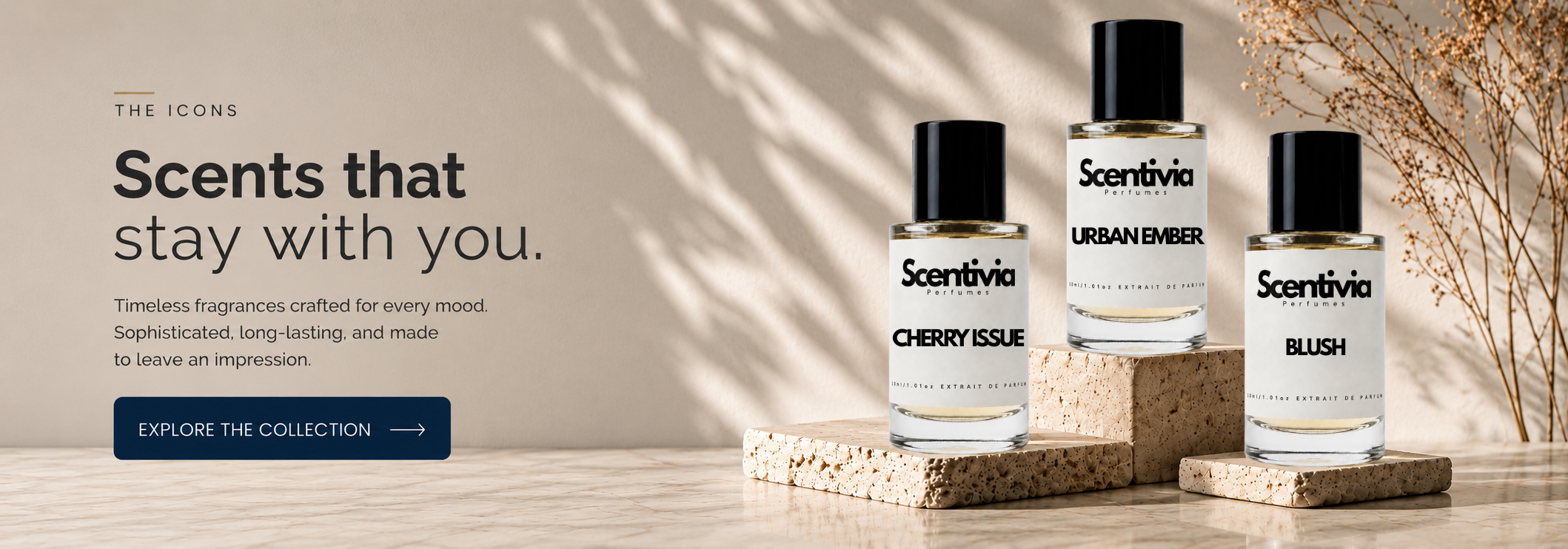 Three bottles of Scentivia fragrances on a wooden surface with a neutral background.